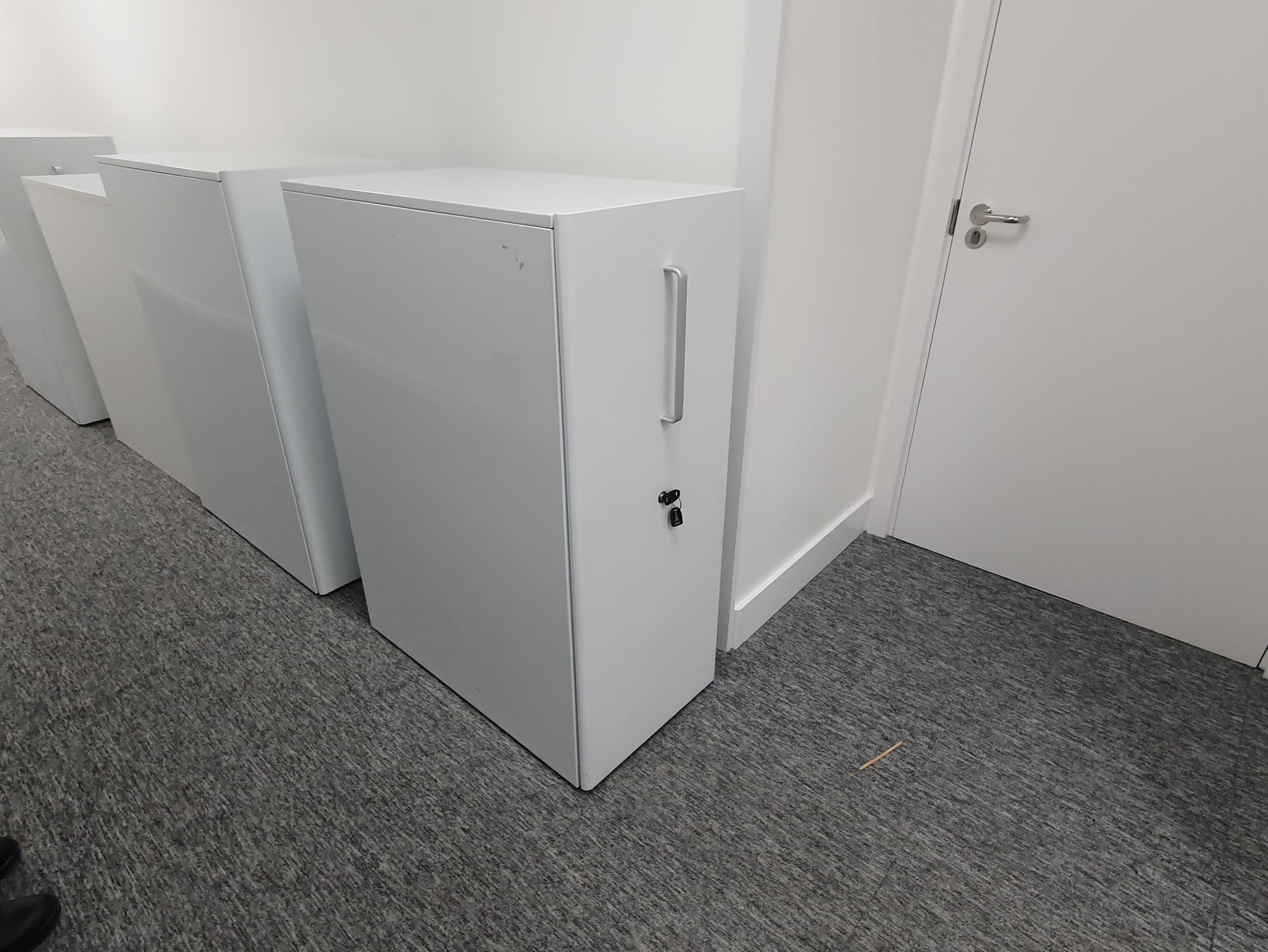 White Caddy Pedestal Cabinet with silver chrome handle