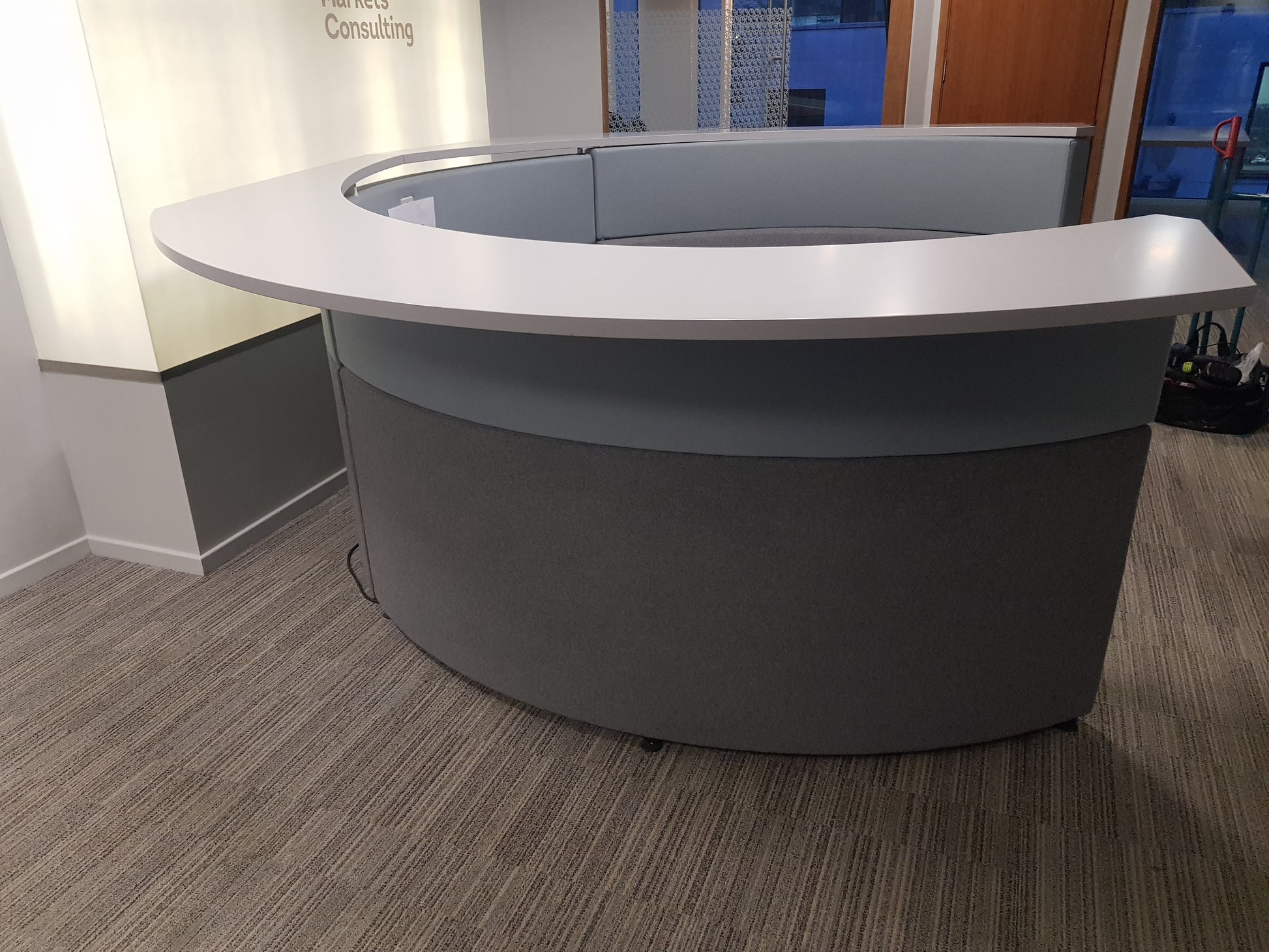the side of a Connections Flock Modular Circular Meeting Booth