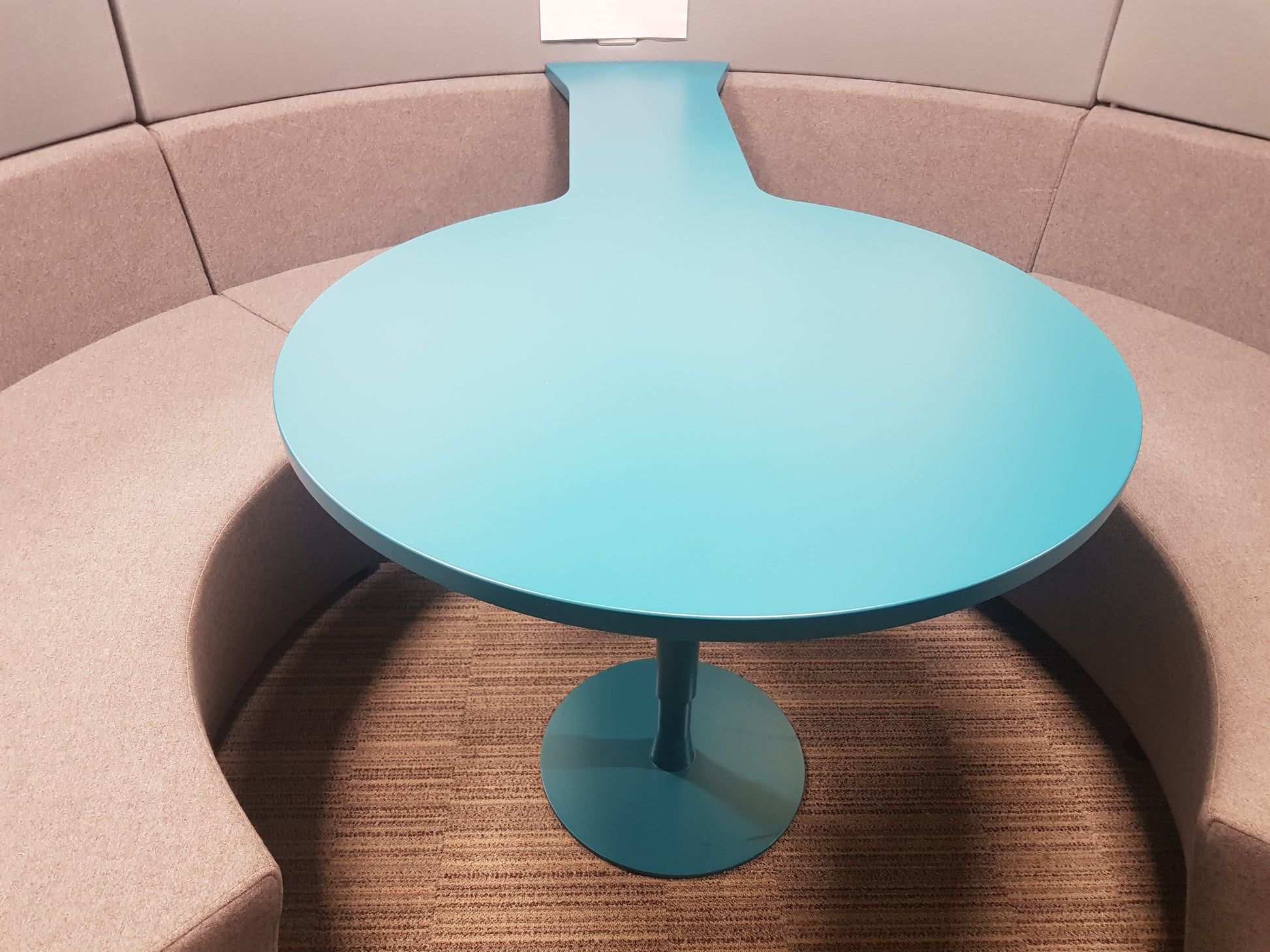 blue table of a grey and blue contrast Connections Flock Modular Circular Meeting Booth
