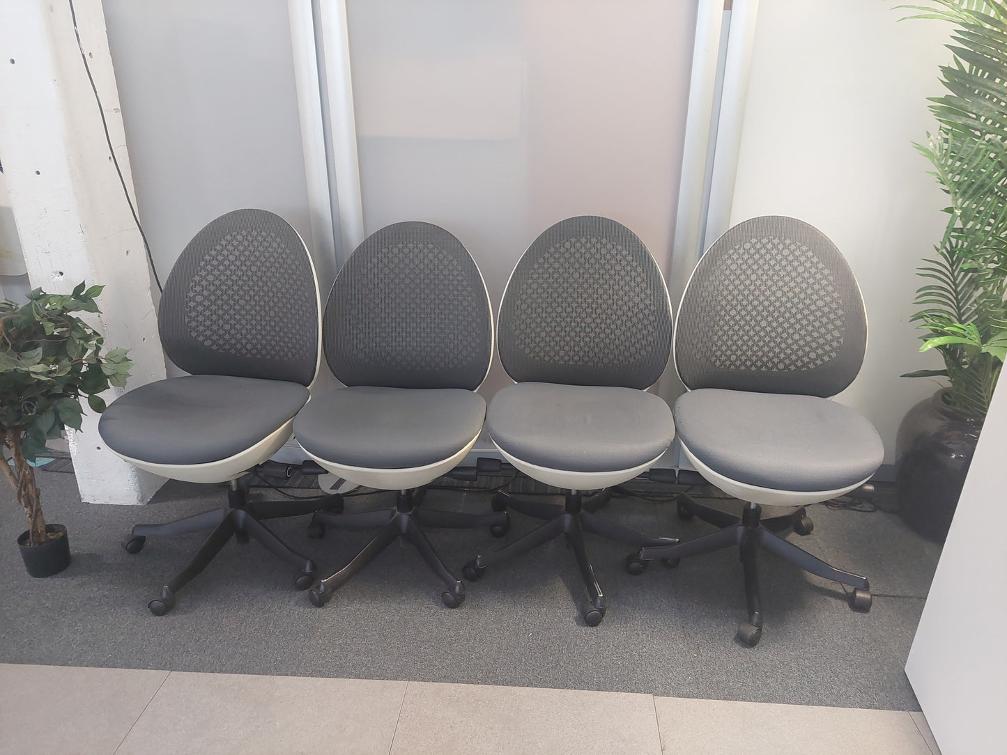 Modern egg-shaped office chair on swivel base £120 each