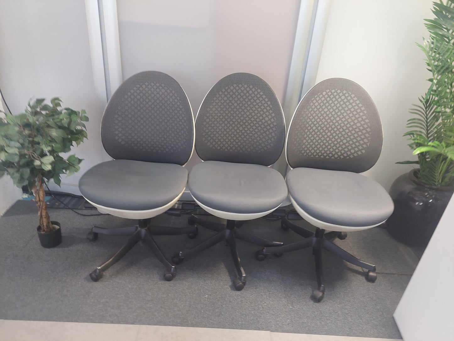Modern egg-shaped office chair on swivel base £120 each