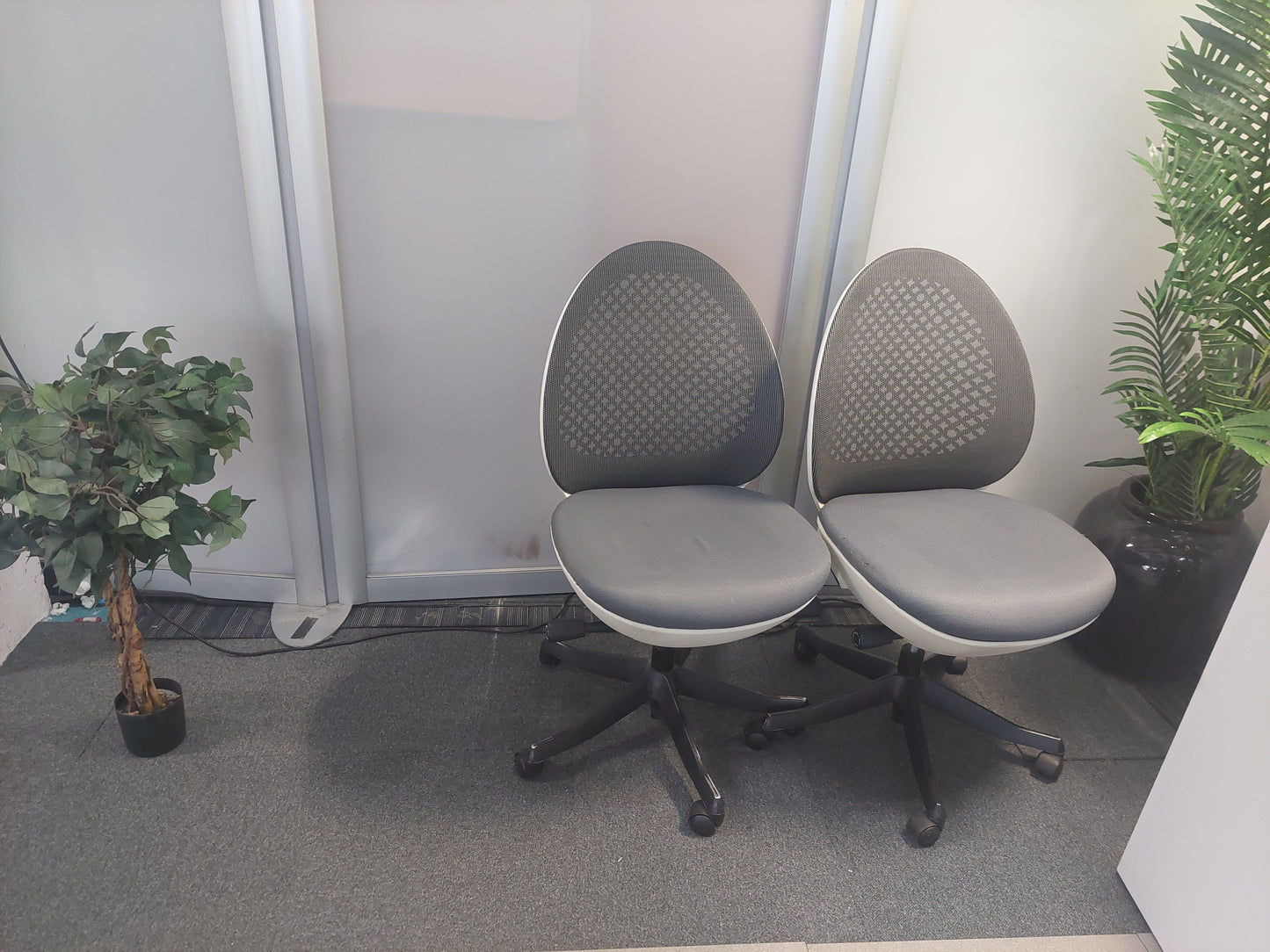 Modern egg-shaped office chair on swivel base £120 each