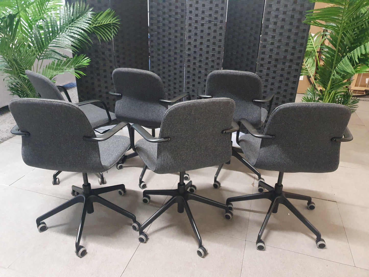 Grey Adjustable office chair, wheeled castors with arms