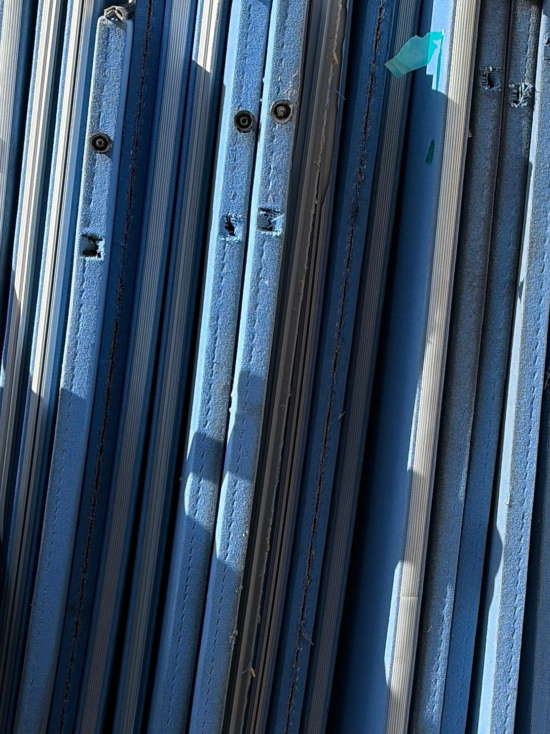 Used wide acoustic office screen divider large free-standing upholstered in a textured blue fabric