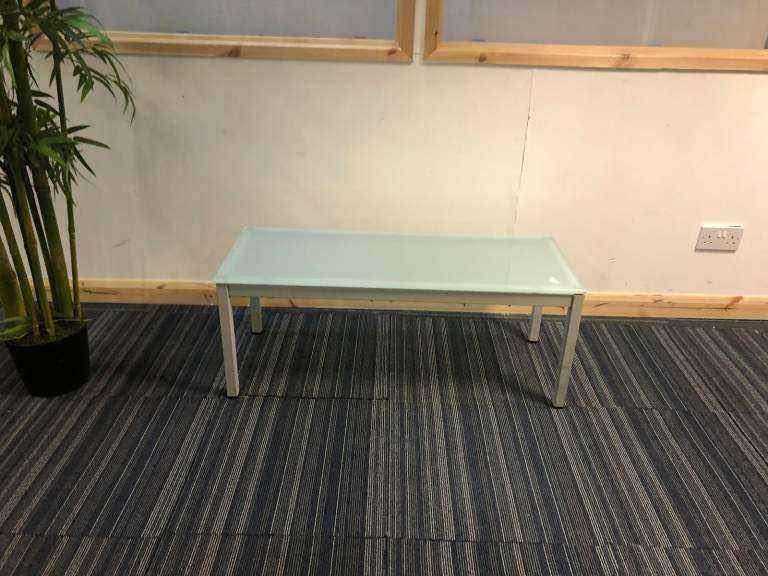 Blue hued glass rectangle office reception waiting breakout area coffee table W=98cm D=38cm H=40cm