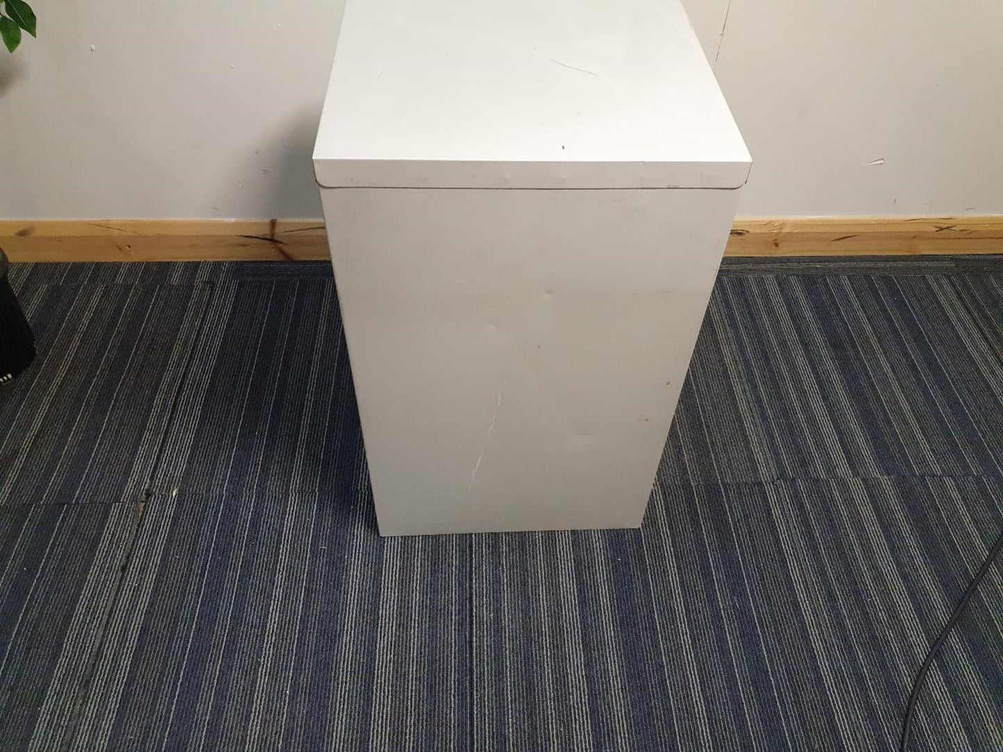 Back of grey filing cabinet