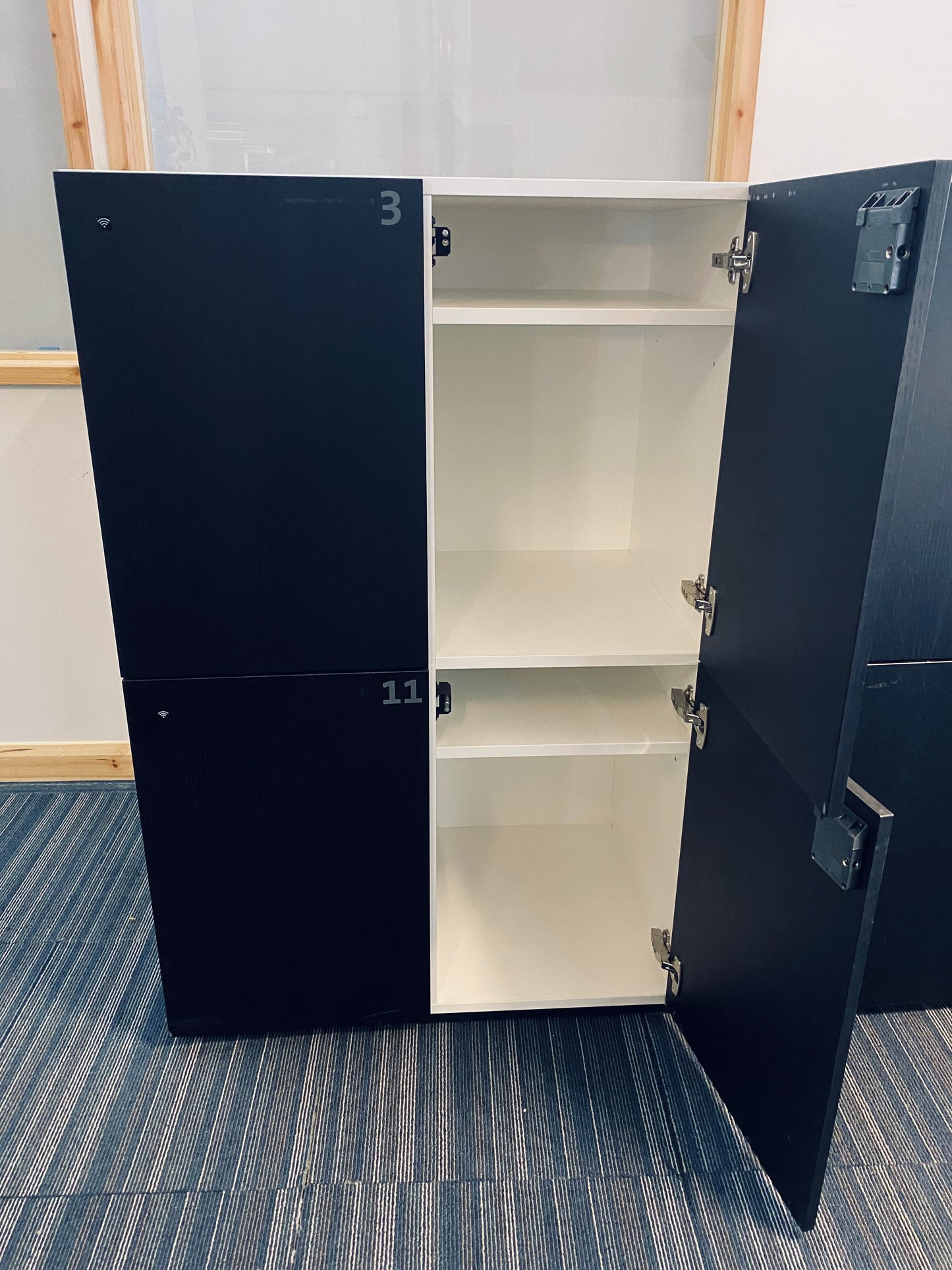 Locker with 2 doors open 2 doors shut black and white lockers