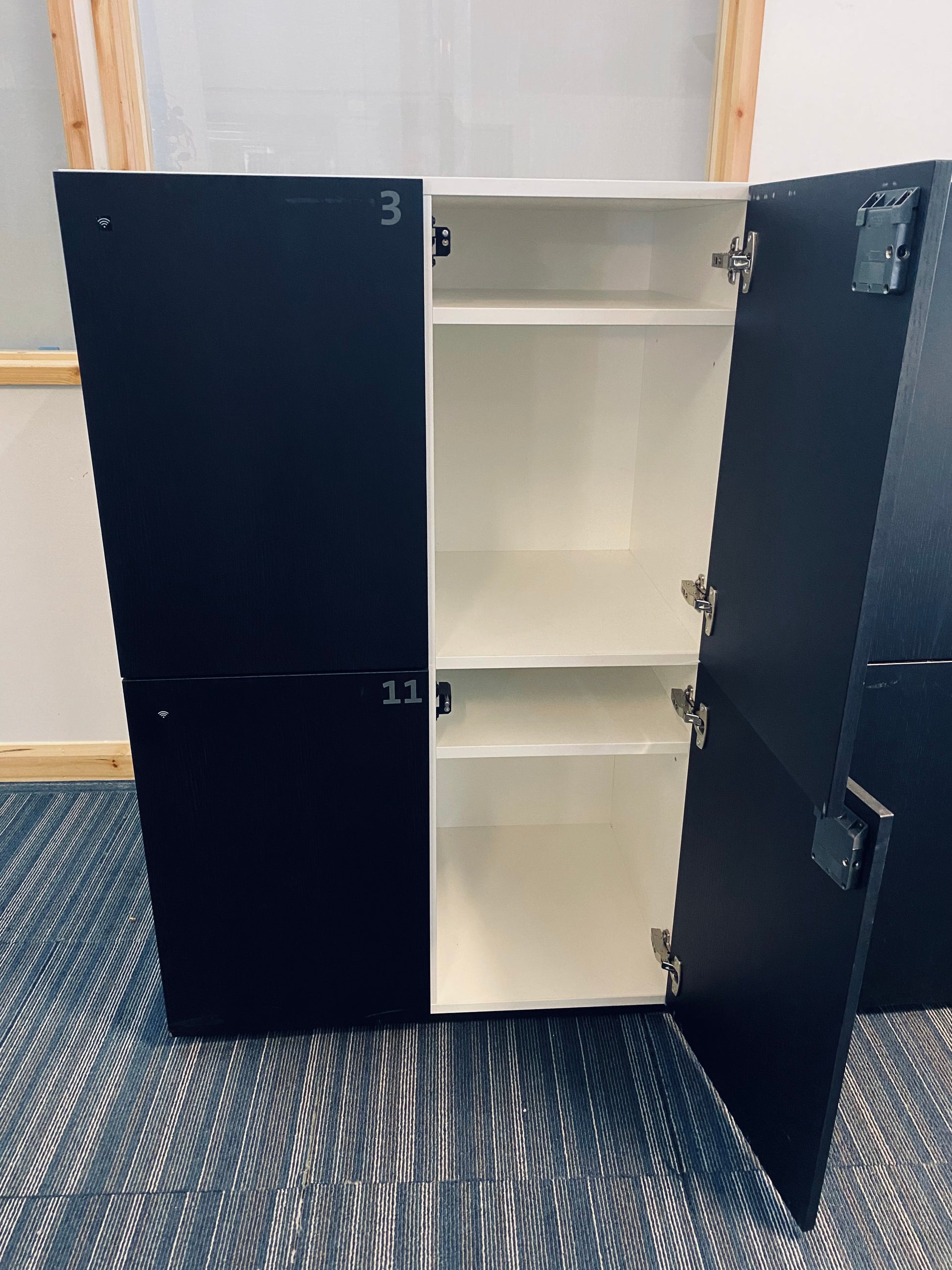 Locker with 2 doors open 2 doors shut black and white lockers