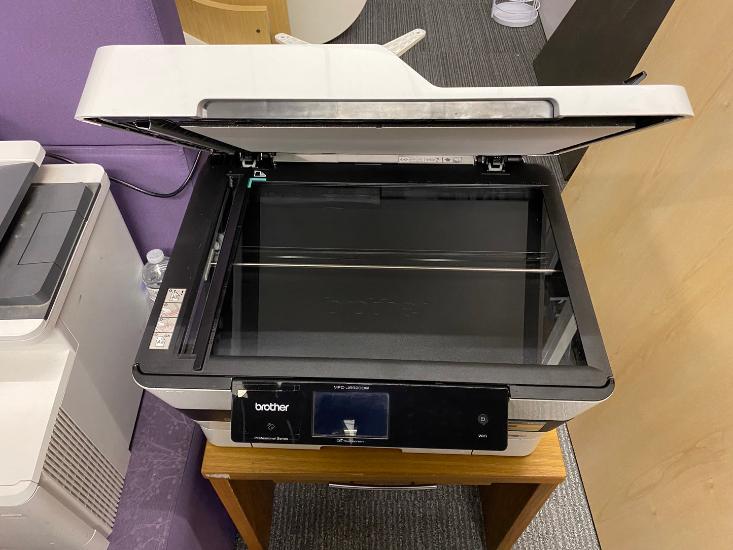 scanning screen of a Brother MFC-J6920DW A3 Colour Inkjet Multifunction Printer on a low brown table