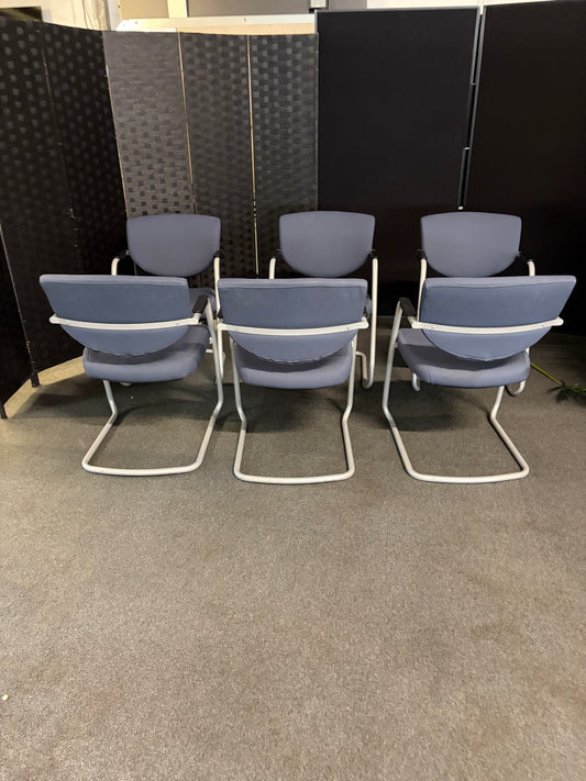 Pre-owned Vitra Vis-a-Vis style meeting chair with cantilever frame and blue fabric