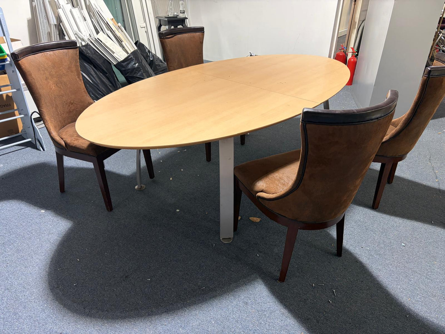 Used modern-style brown dining chairs