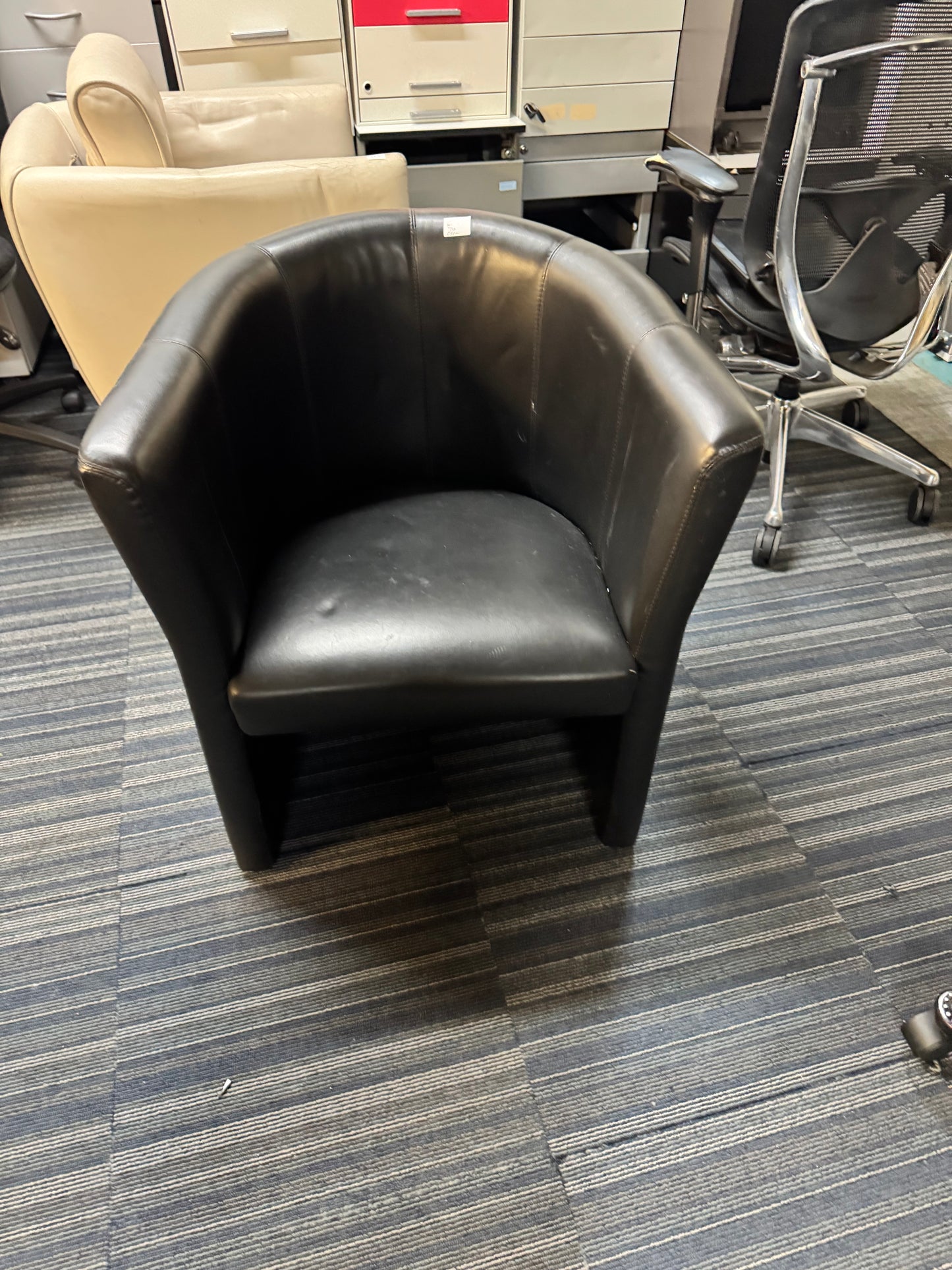Used leather armchair in black