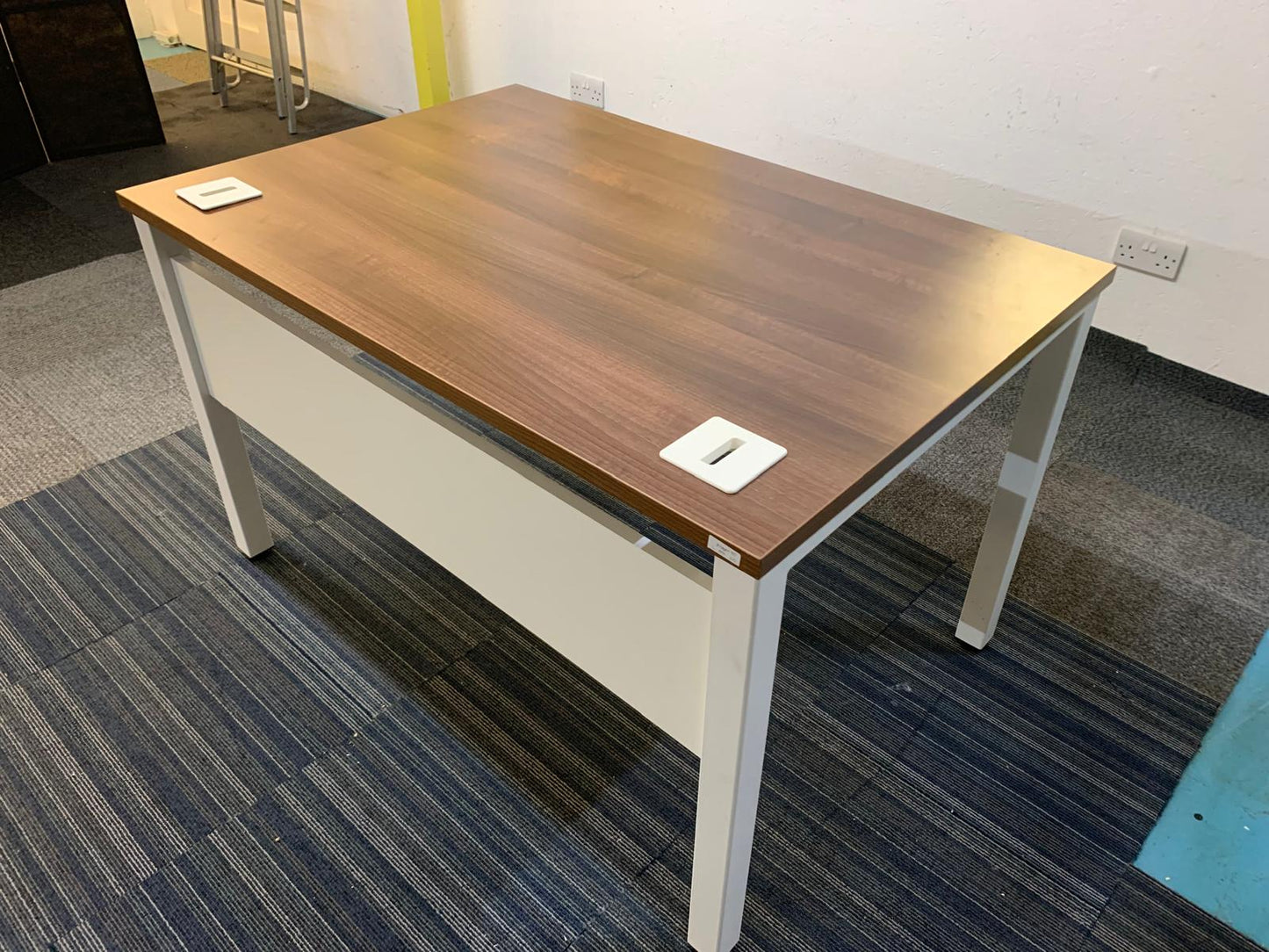 Walnut finish study desk with contrasting white legs and modesty panel