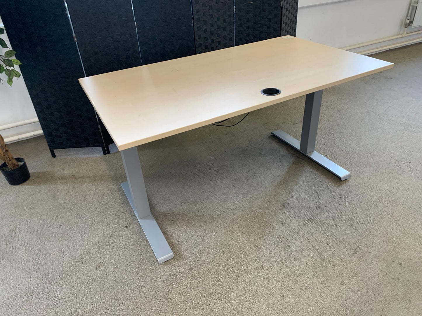 Light brown electric stand up office desk, sit stand height adjustable table in maple finish