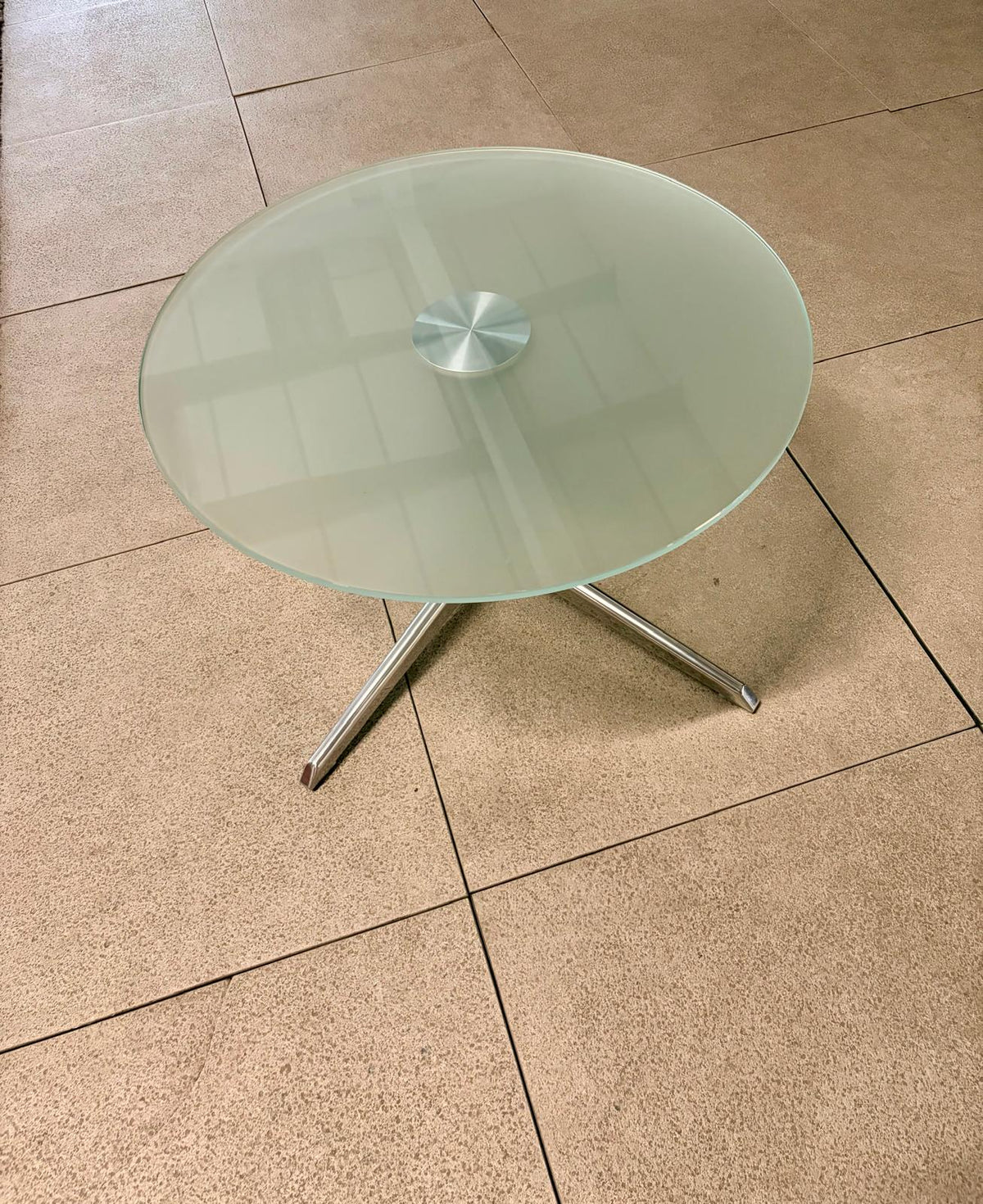 Used coffee table glass elegant top design round silver colour metal base 660mm diameter 410mm height
