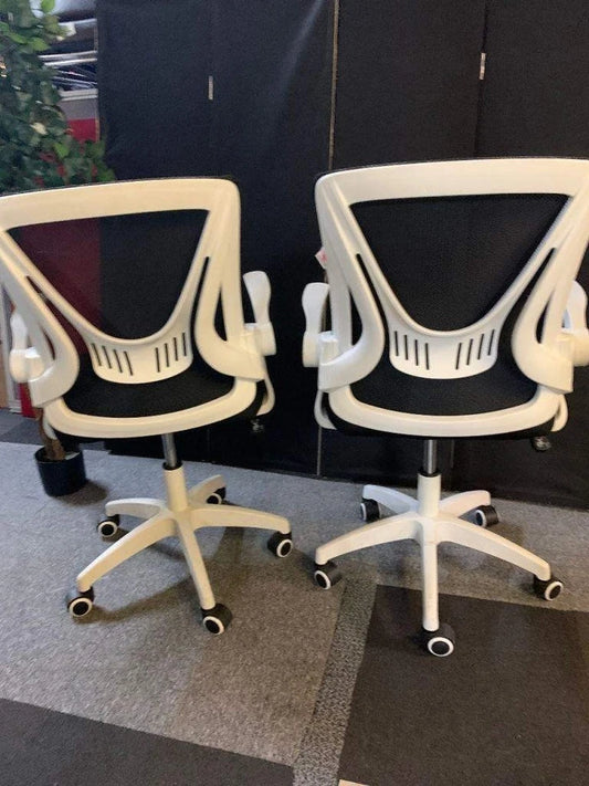 Used operator adjustable swivel chair Black and white contrast