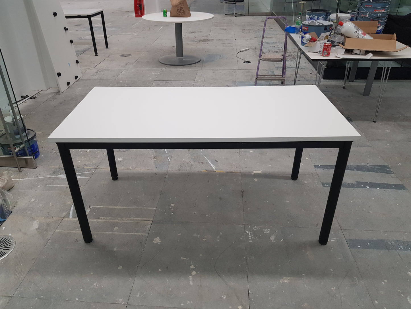 white folding office table with black legs
