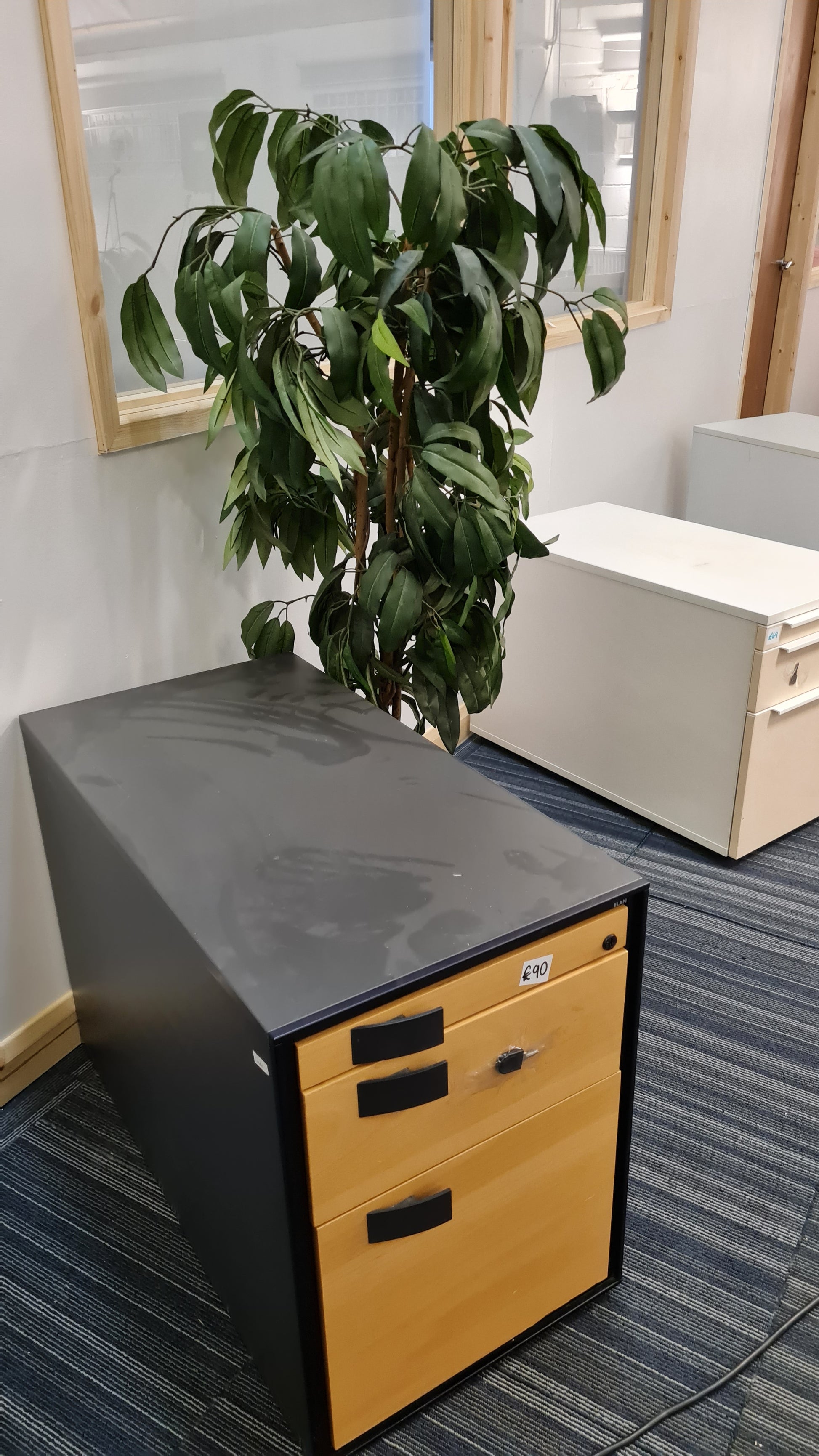 Office drawers on blue carpet