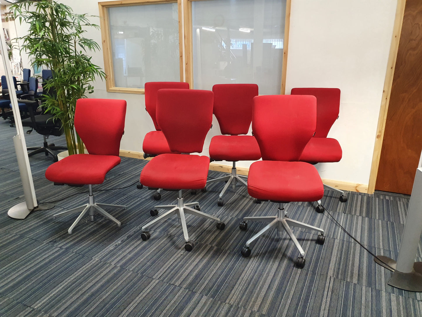 Red Swivel Office Chair by Orangebox on castors - no arms