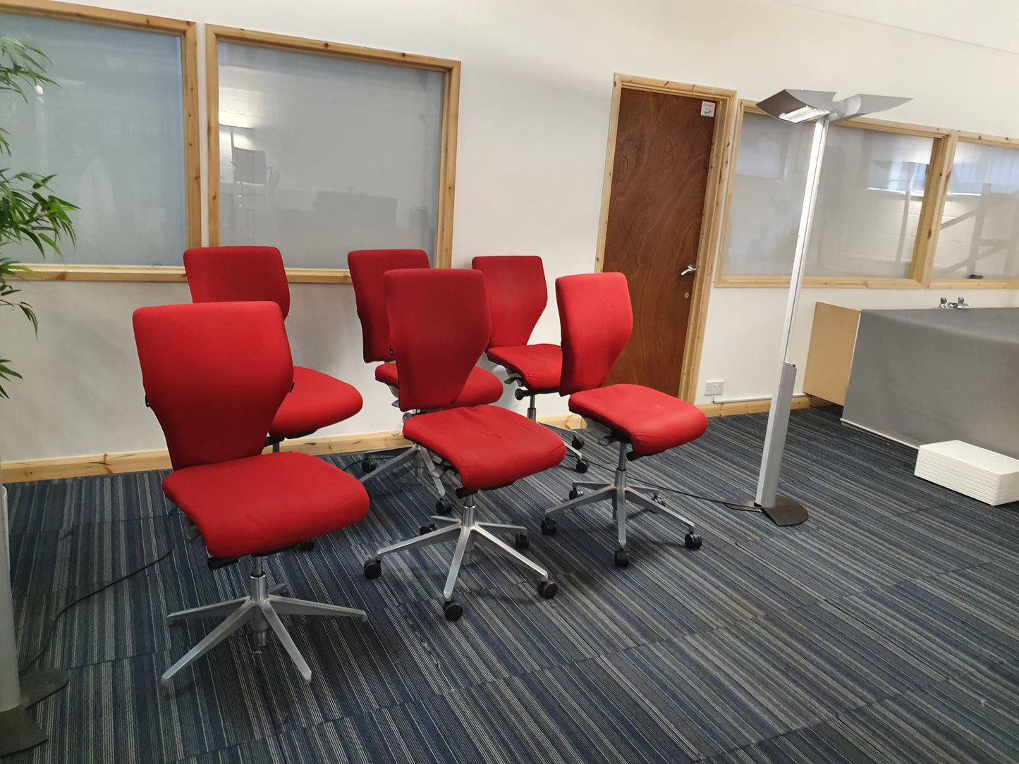 Red Swivel Office Chair by Orangebox on castors - no arms