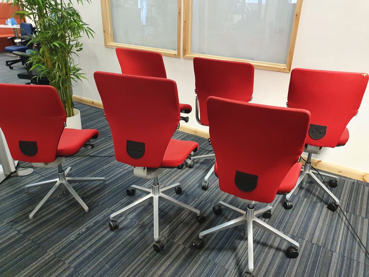 Red Swivel Office Chair by Orangebox on castors - no arms
