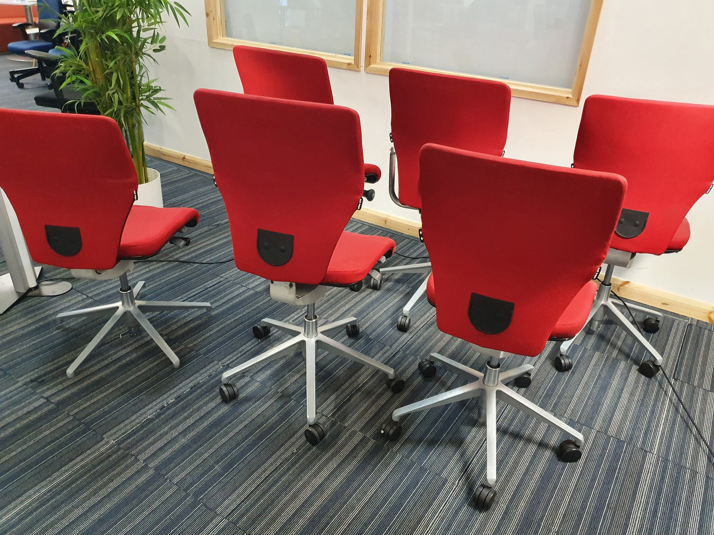 Red Swivel Office Chair by Orangebox on castors - no arms