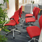 Red Swivel Office Chair by Orangebox on castors - no arms