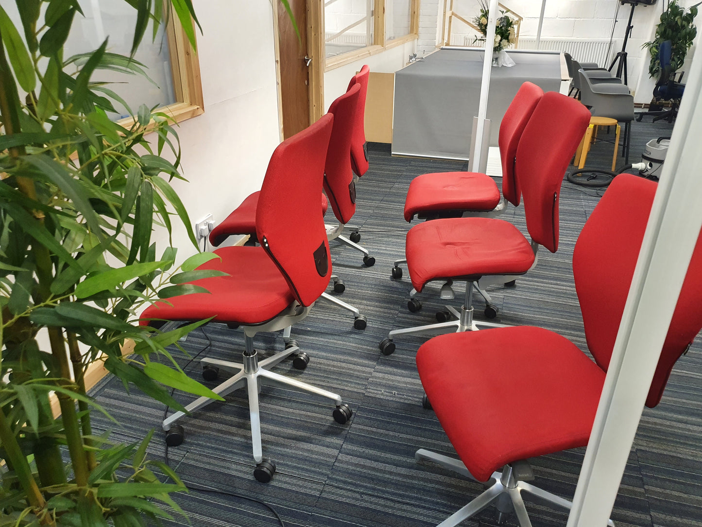 Red Swivel Office Chair by Orangebox on castors - no arms