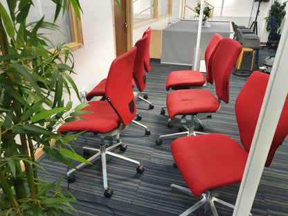 Red Swivel Office Chair by Orangebox on castors - no arms
