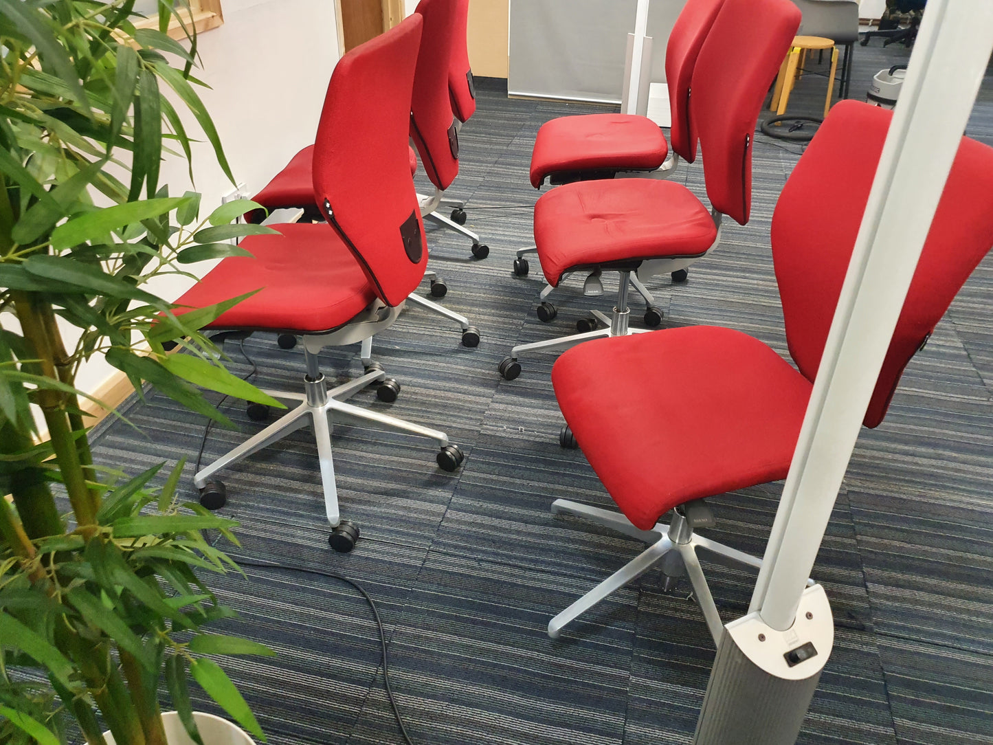 Red Swivel Office Chair by Orangebox on castors - no arms