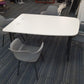 White 5 seater meeting table and grey dining chairs