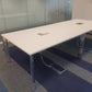 White meeting table and silver chrome legs