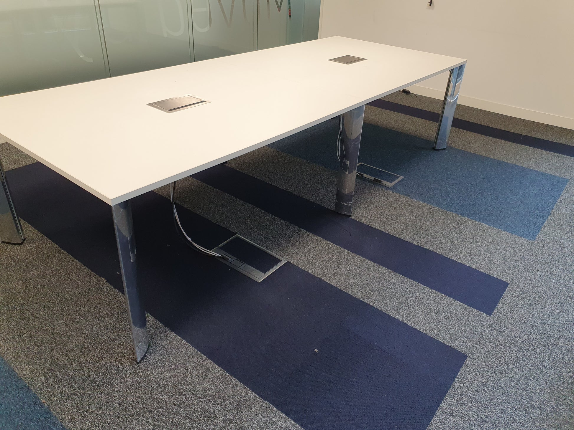 Conference table in meeting room on carpet