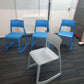 Four blue canteen and waiting area chairs