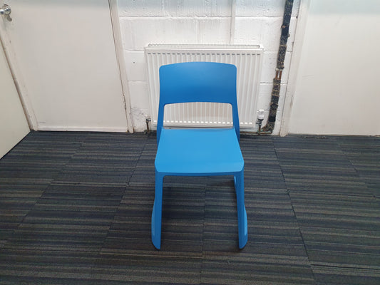 Blue reception chair on blue carpet