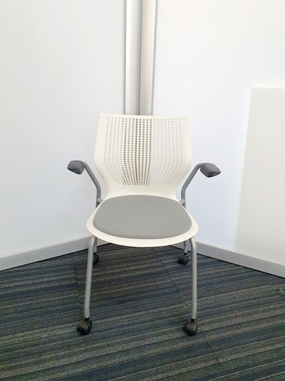 White meeting chair with wheels