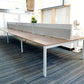 walnut table with three grey dividers and grey legs