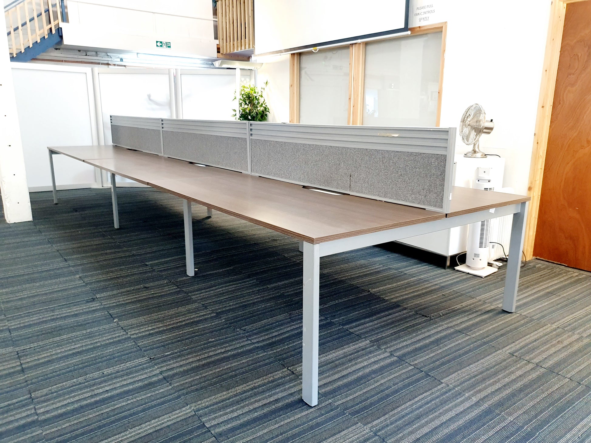 walnut table with three grey dividers and grey legs