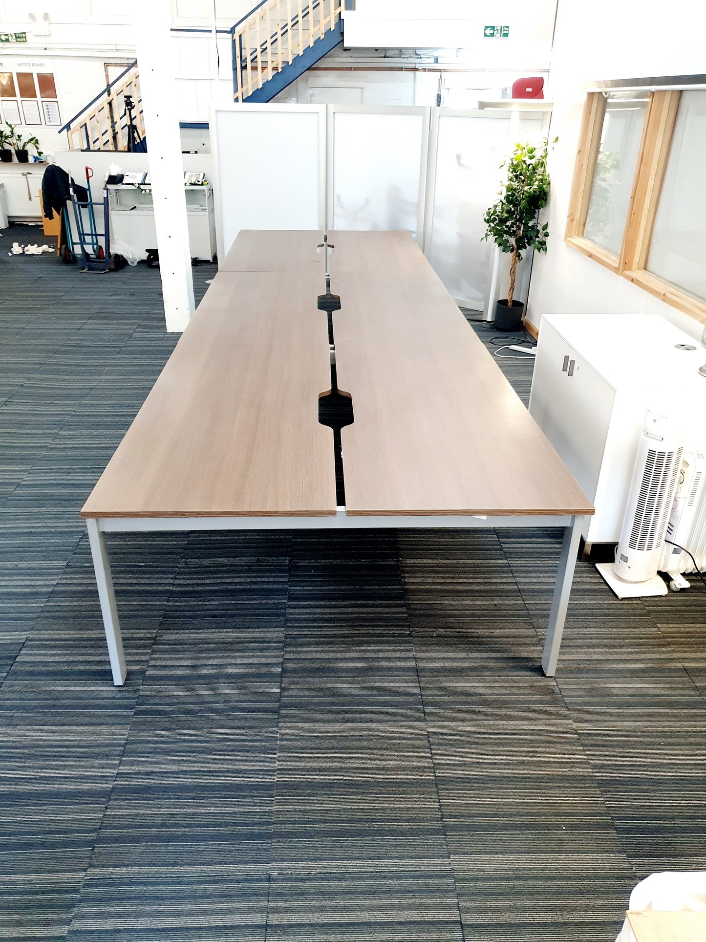 large office pod desk seating in walnut in large room