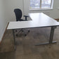 White computer office desk and black swivel operator chair