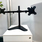 A dual screen monitor arm with adjusted height