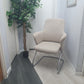 Left, tall green plant, Cream office meeting chair with chrome legs