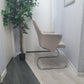 Left, tall green plant, Centre, Side of Beige Senator office meeting chair with chrome legs