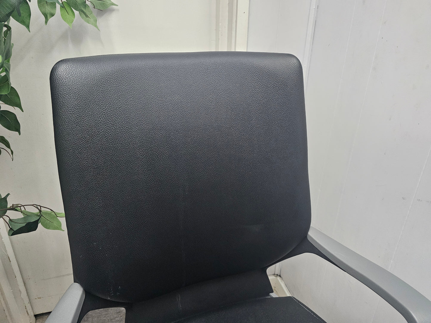 Back of leather office task chair