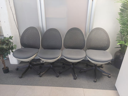 Modern egg-shaped office chair on swivel base  £120 each