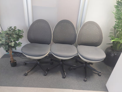 Modern egg-shaped office chair on swivel base  £120 each