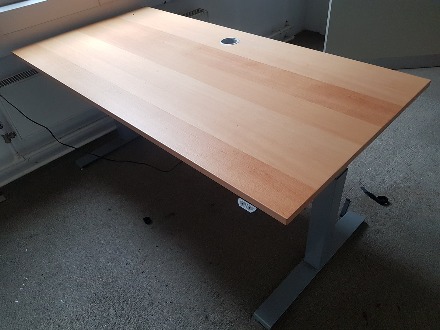 Used Dark beech electric sit stand office desk, height adjustable  160cm x 80cm