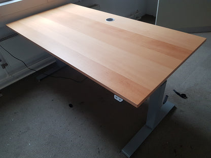 Used Dark beech electric sit stand office desk, height adjustable  160cm x 80cm