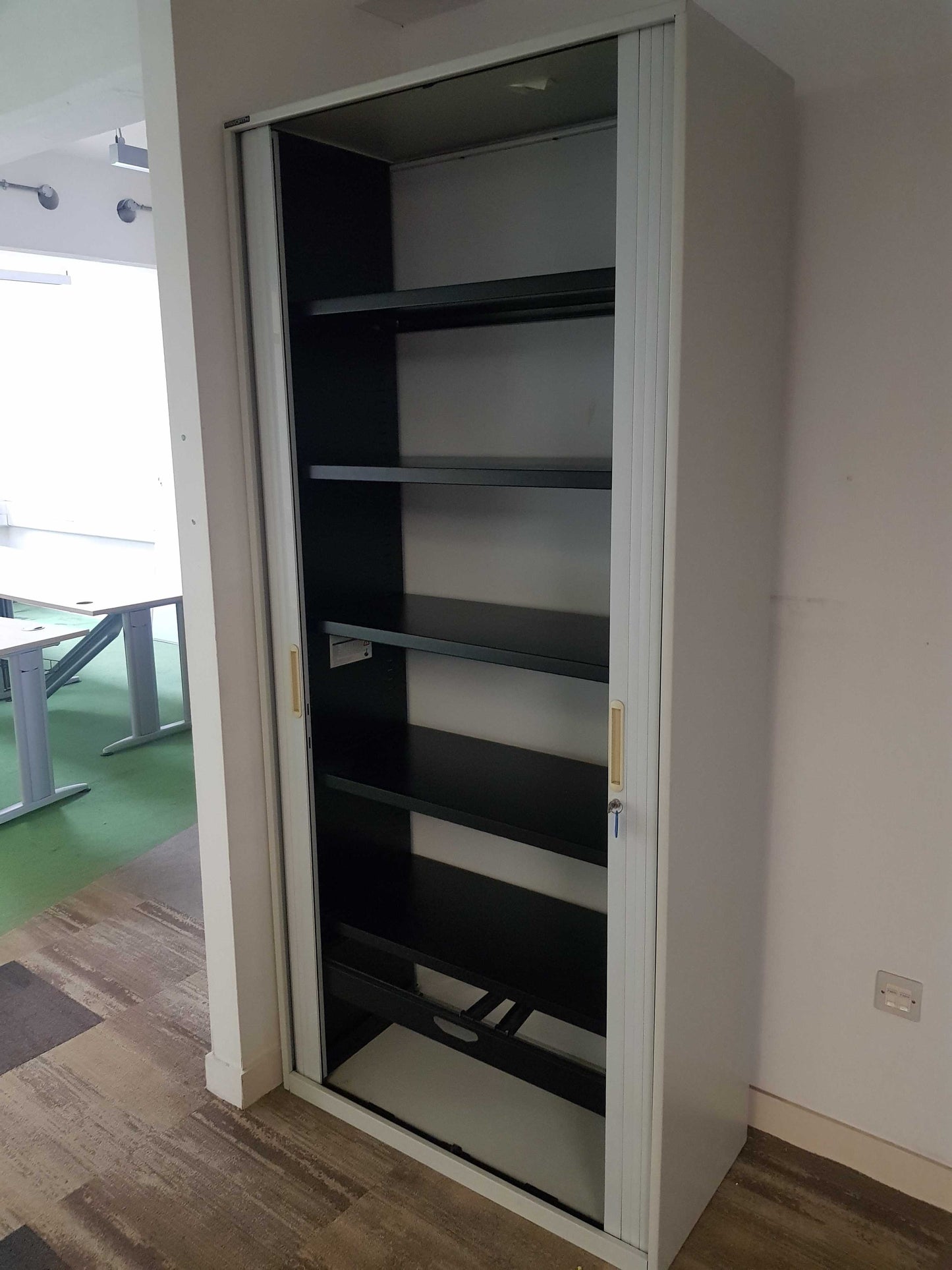 Used Tall Grey rolling door office cabinet, shelf tambour unit