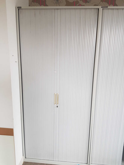 Used Tall Grey rolling door office cabinet, shelf tambour unit